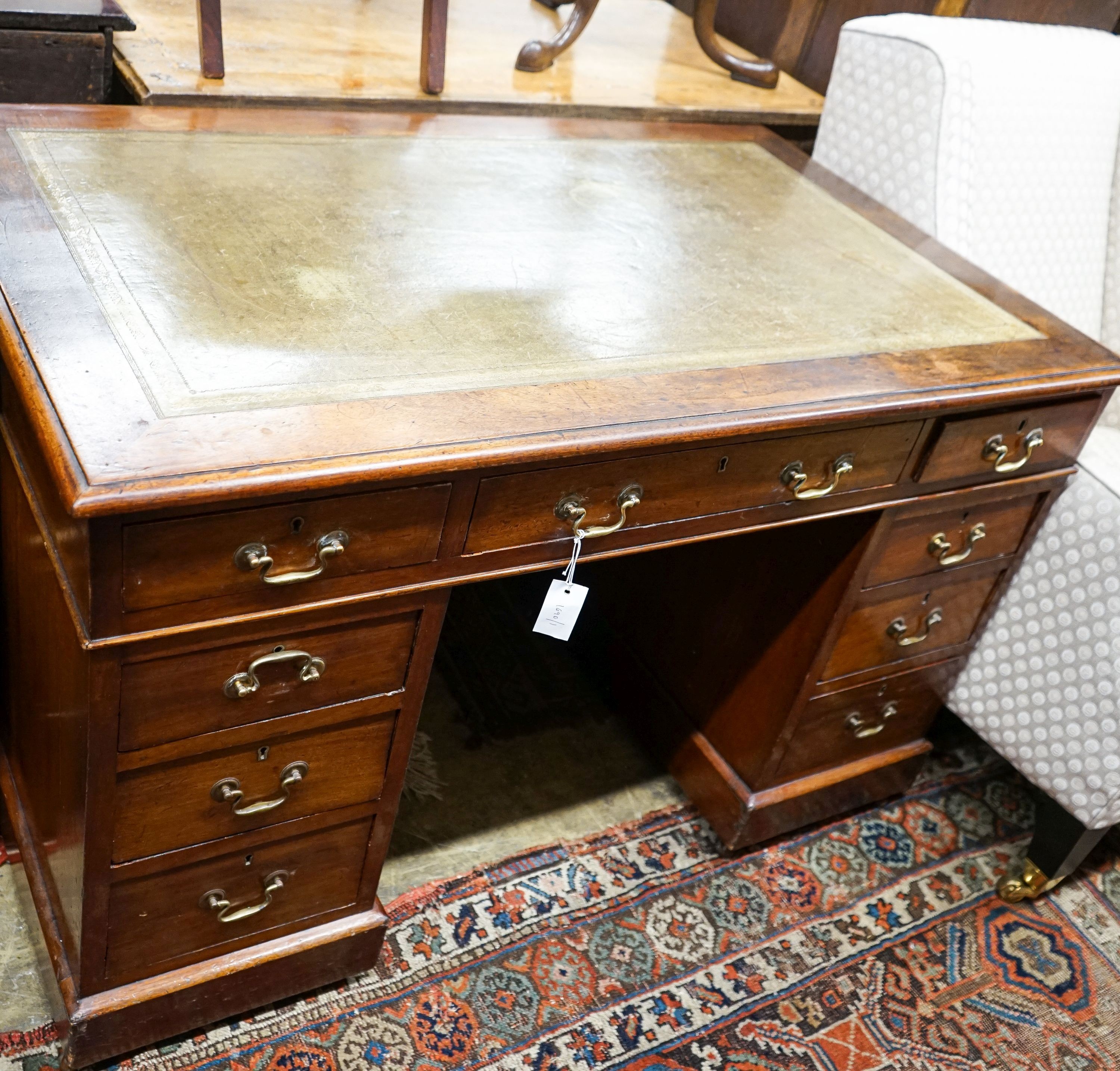 A late Victorian mahogany pedestal desk, length 122cm, depth 74cm, height 76cm